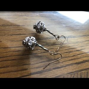 Round textured earrings with silver stones